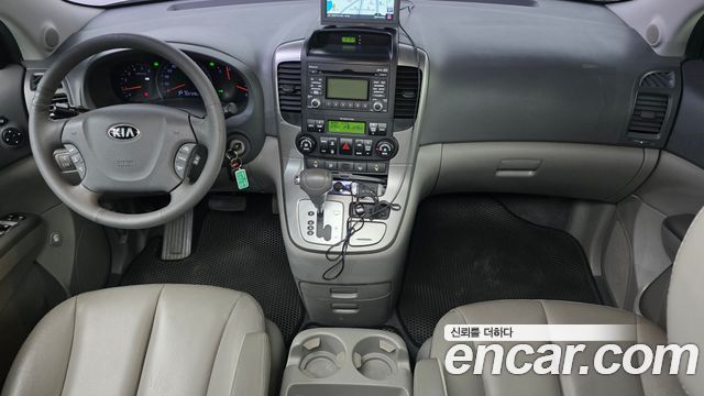 Kia Canival 2013 — photo 10