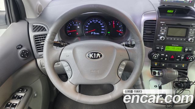 Kia Canival 2013 — photo 19