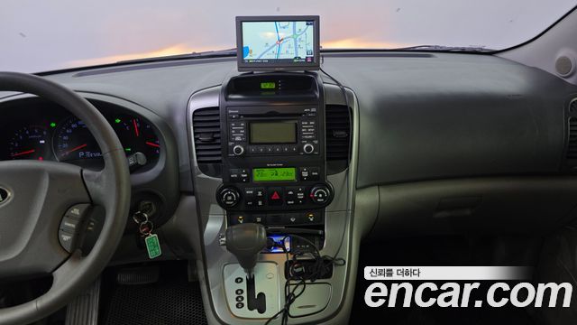 Kia Canival 2013 — photo 20