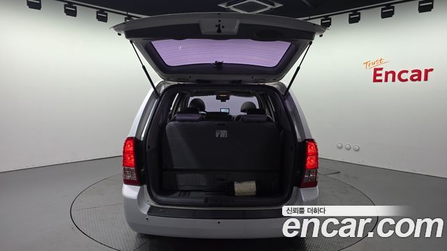 Kia Canival 2013 — photo 25