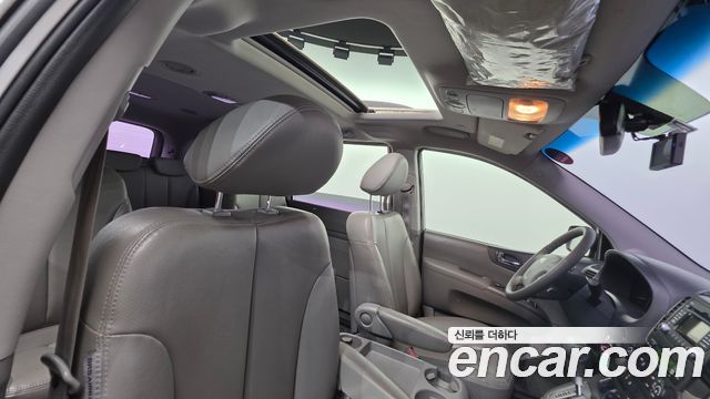 Kia Canival 2013 — photo 26