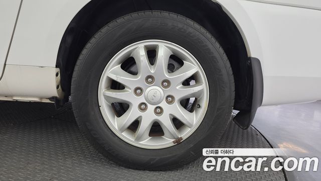 Kia Canival 2013 — photo 7