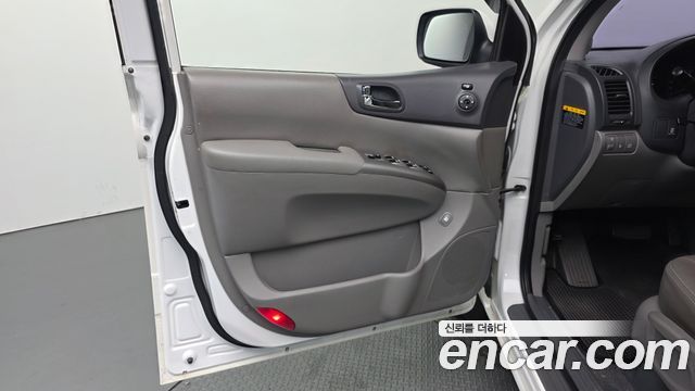 Kia Canival 2013 — photo 14