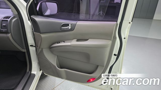 Kia Canival 2013 — photo 15