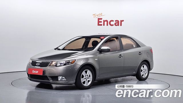 Kia Porte 2011 — photo 1