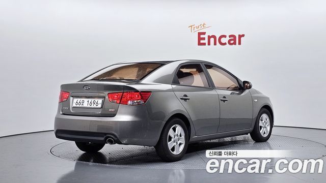 Kia Porte 2011 — photo 2