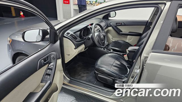 Kia Porte 2011 — photo 10