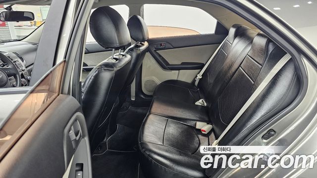 Kia Porte 2011 — photo 12
