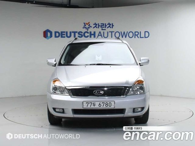 Kia Canival 2011 — photo 3