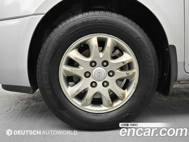 Kia Canival 2011 — photo 5