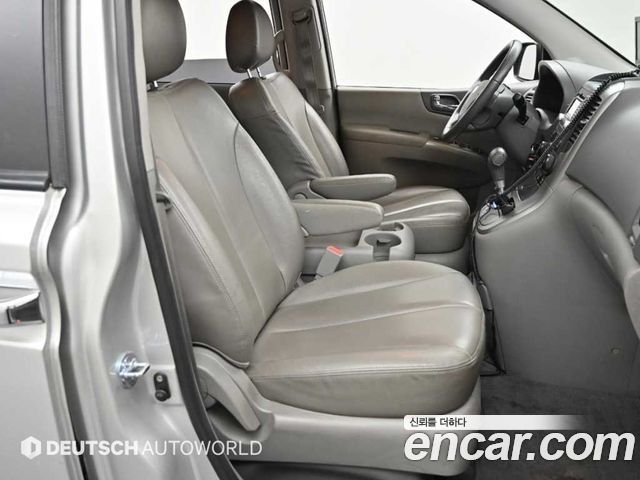 Kia Canival 2011 — photo 10