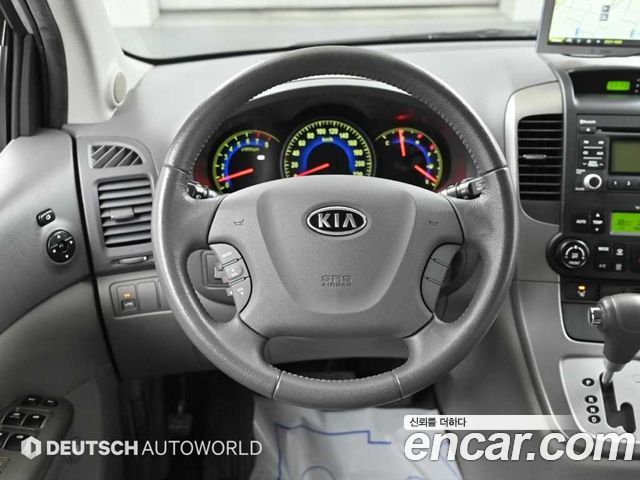 Kia Canival 2011 — photo 13
