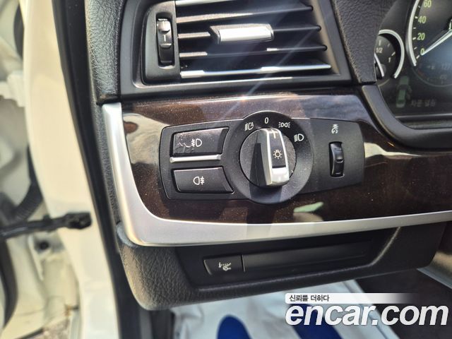 BMW 5-Series 2012 — photo 12