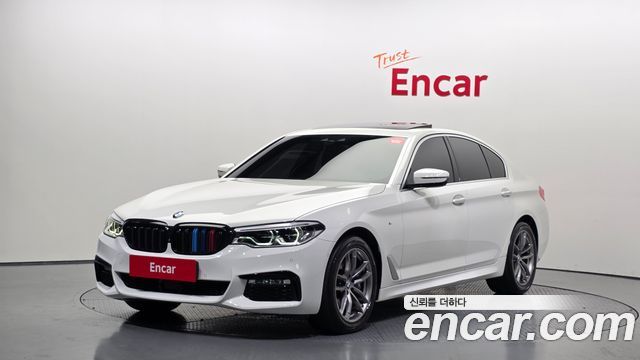 BMW 5-Series 2018 — photo 1