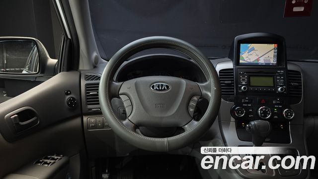 Kia Canival 2014 — photo 19