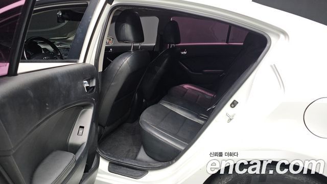Kia K3 2013 — photo 25