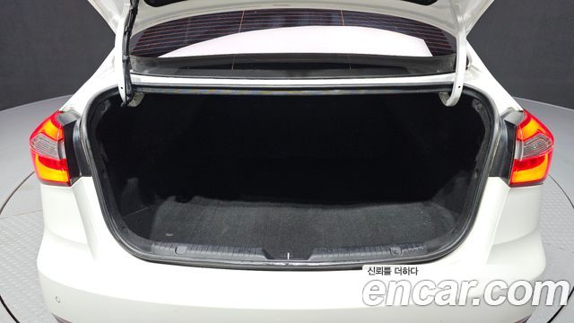 Kia K3 2013 — photo 26
