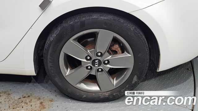 Kia K3 2013 — photo 7