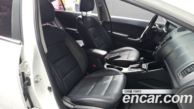 Kia K3 2013 — photo 16