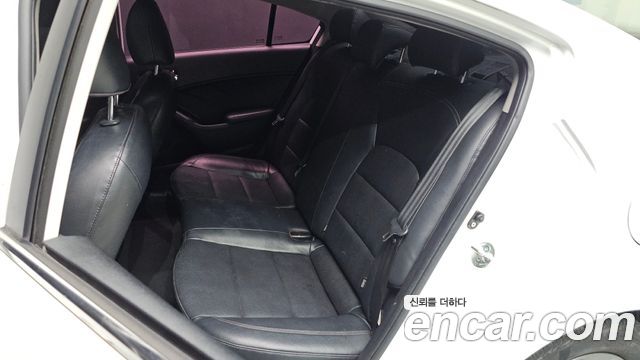Kia K3 2013 — photo 28