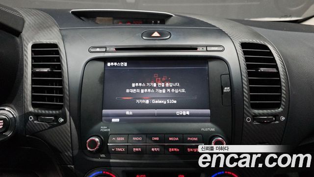 Kia K3 2013 — photo 31