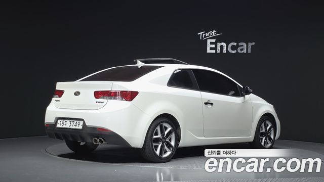 Kia Porte 2010 — photo 2