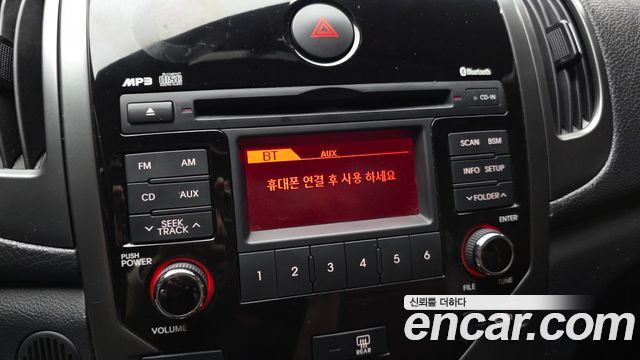 Kia Porte 2010 — photo 16