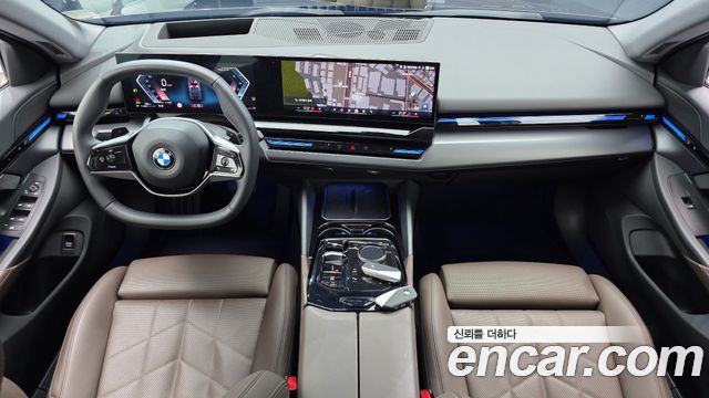 BMW 5-Series 2024 — photo 10