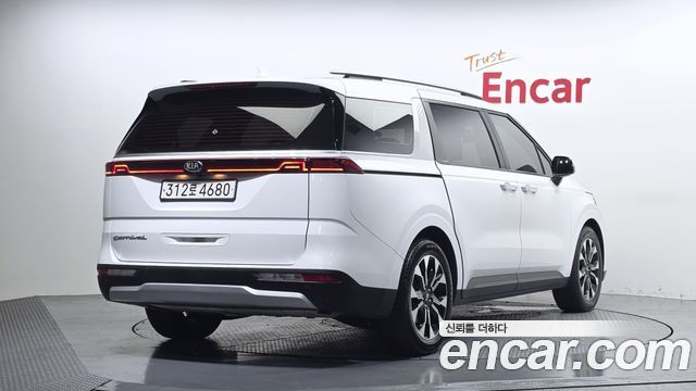Kia Canival 2021 — photo 2