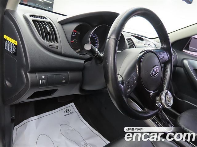 Kia Porte 2013 — photo 14