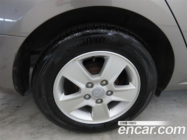 Kia Porte 2013 — photo 19