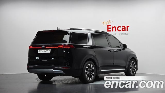 Kia Canival 2021 — photo 2