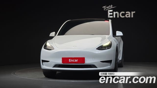 Tesla Model Y 2024 — photo 3