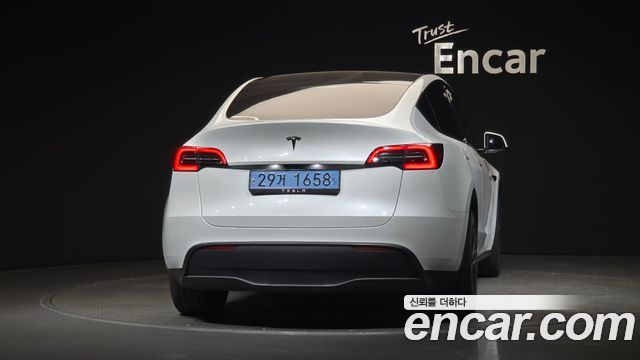 Tesla Model Y 2024 — photo 4