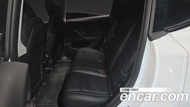 Tesla Model Y 2024 — photo 17