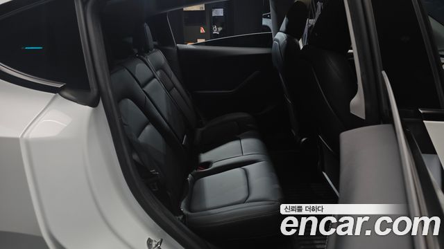 Tesla Model Y 2024 — photo 18