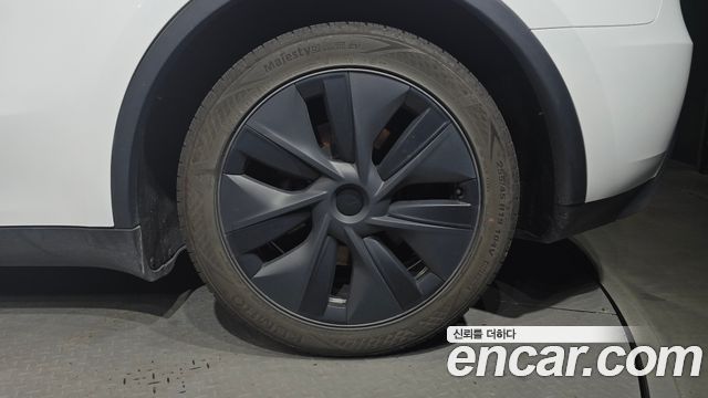 Tesla Model Y 2024 — photo 7