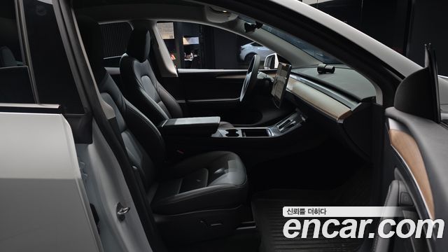 Tesla Model Y 2024 — photo 16