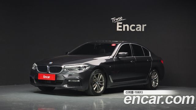BMW 5-Series 2018 — photo 1