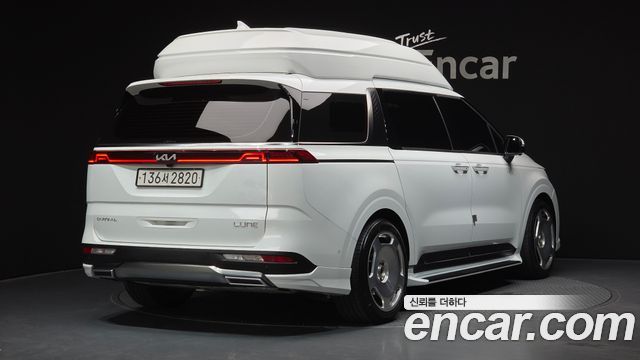 Kia Canival 2023 — photo 2
