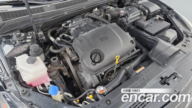 Kia K7 2010 — photo 6