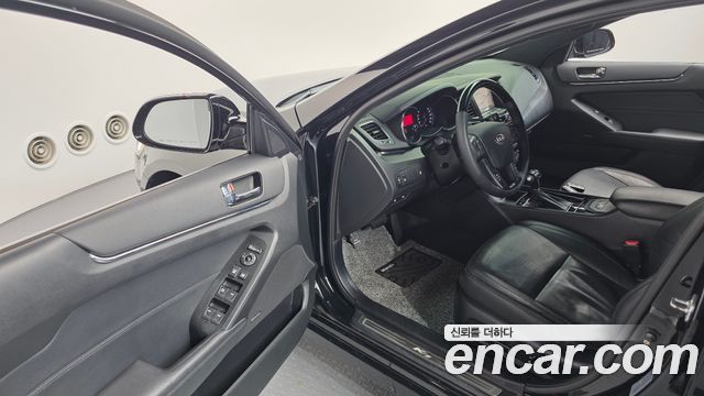 Kia K7 2010 — photo 11