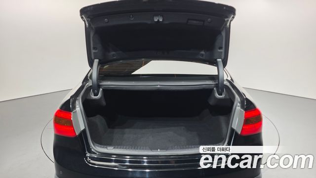 Kia K7 2010 — photo 20