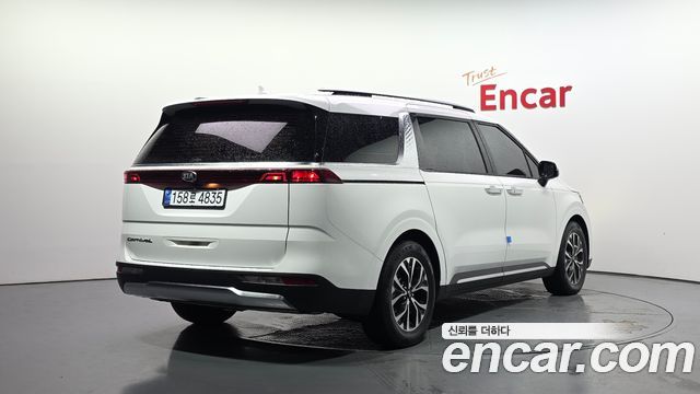 Kia Canival 2021 — photo 2