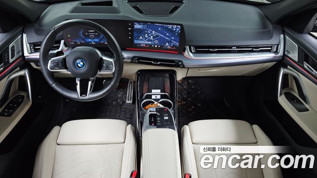 BMW iX2 2024 — photo 10