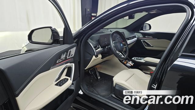 BMW iX2 2024 — photo 13