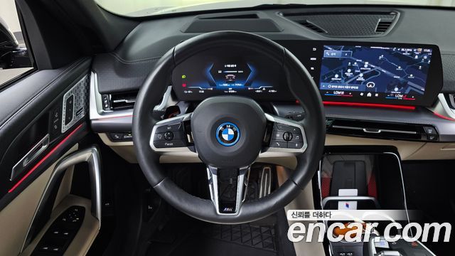 BMW iX2 2024 — photo 20