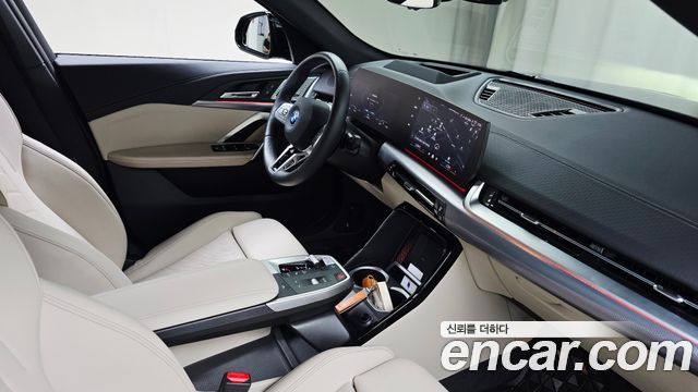 BMW iX2 2024 — photo 25