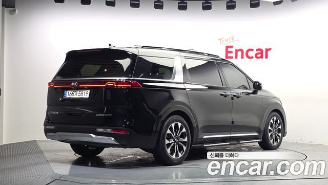 Kia Canival 2021 — photo 2