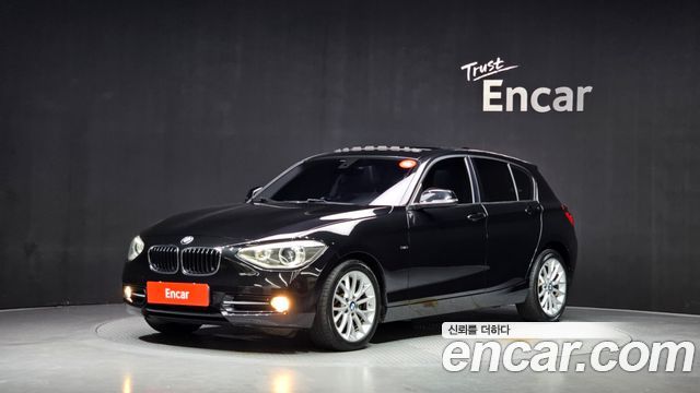 BMW 1-Series 2015 — photo 1